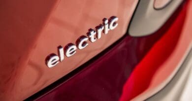 Electric car badge