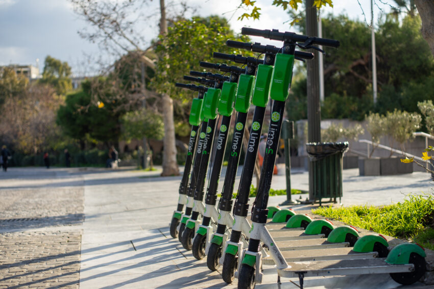 Row of electric scooters for rent