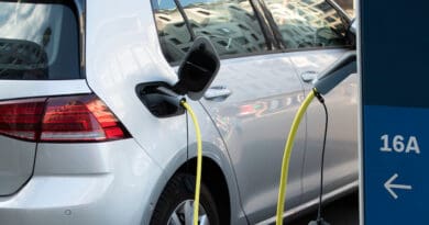 silver electric car charging