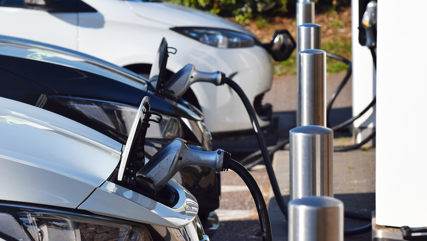 Electric cars charging at Electric Vehicle Charging Points