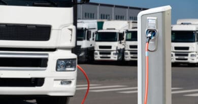 Electric truck with charging station