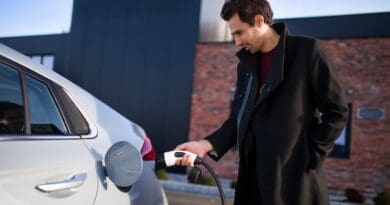 learner driver charging electric car