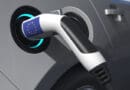 Charging plug in an electric car with flag of the european union