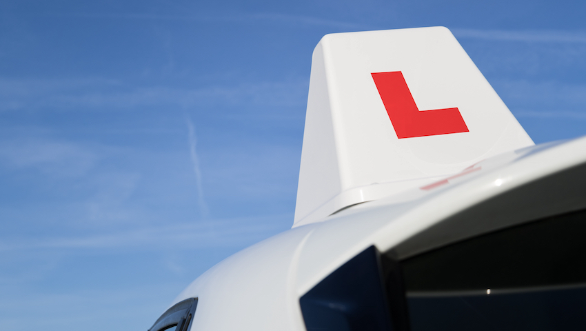 British driving school car roof sign