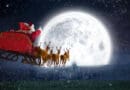 Santa Claus riding on sleigh with gift box against bright moon over city