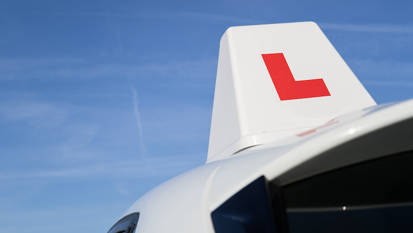 British driving school car roof sign