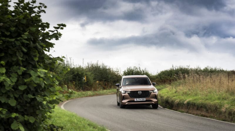 Mazda CX-80 driving