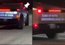 anti-tesla-messages-projected-on-tesla-cybertruck-tailgate-by-cybertruck-hunters