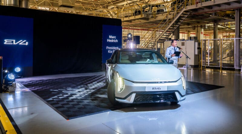 Marc Hedrich, President and CEO, Kia Europe with new Kia EV4