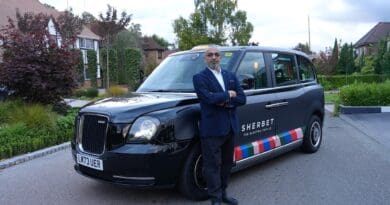 Sherbet-black-cab-CEO-asher-moses-with-taxi
